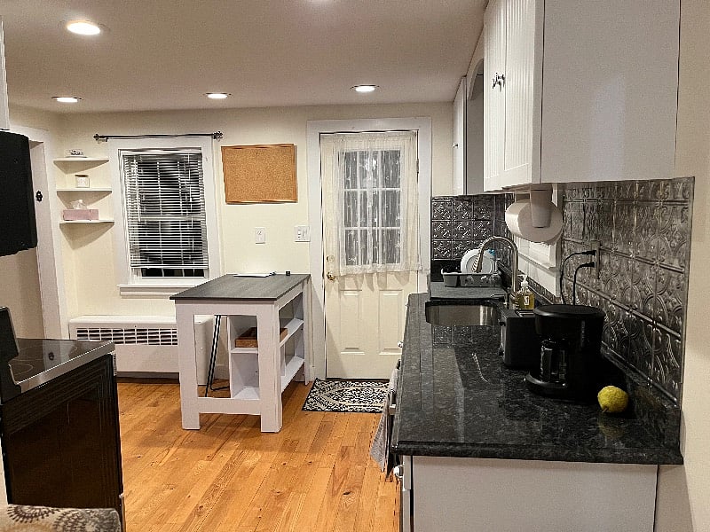 Kitchen and side door looking from dining area.