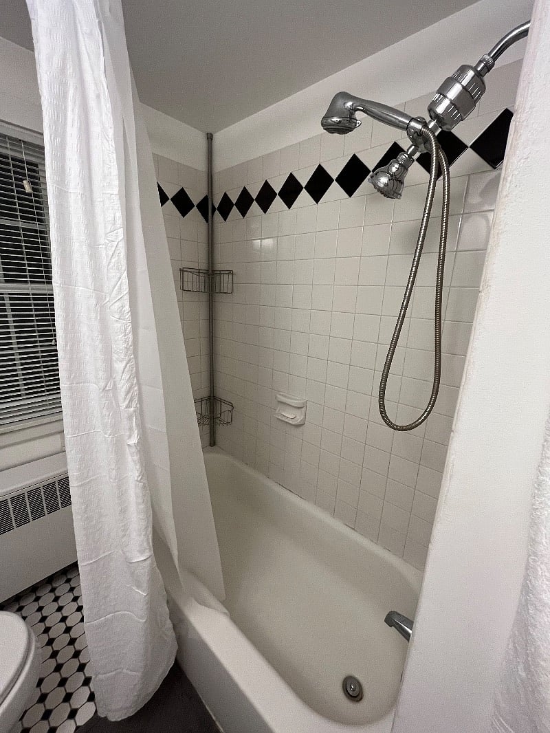 Bathtub and shower.