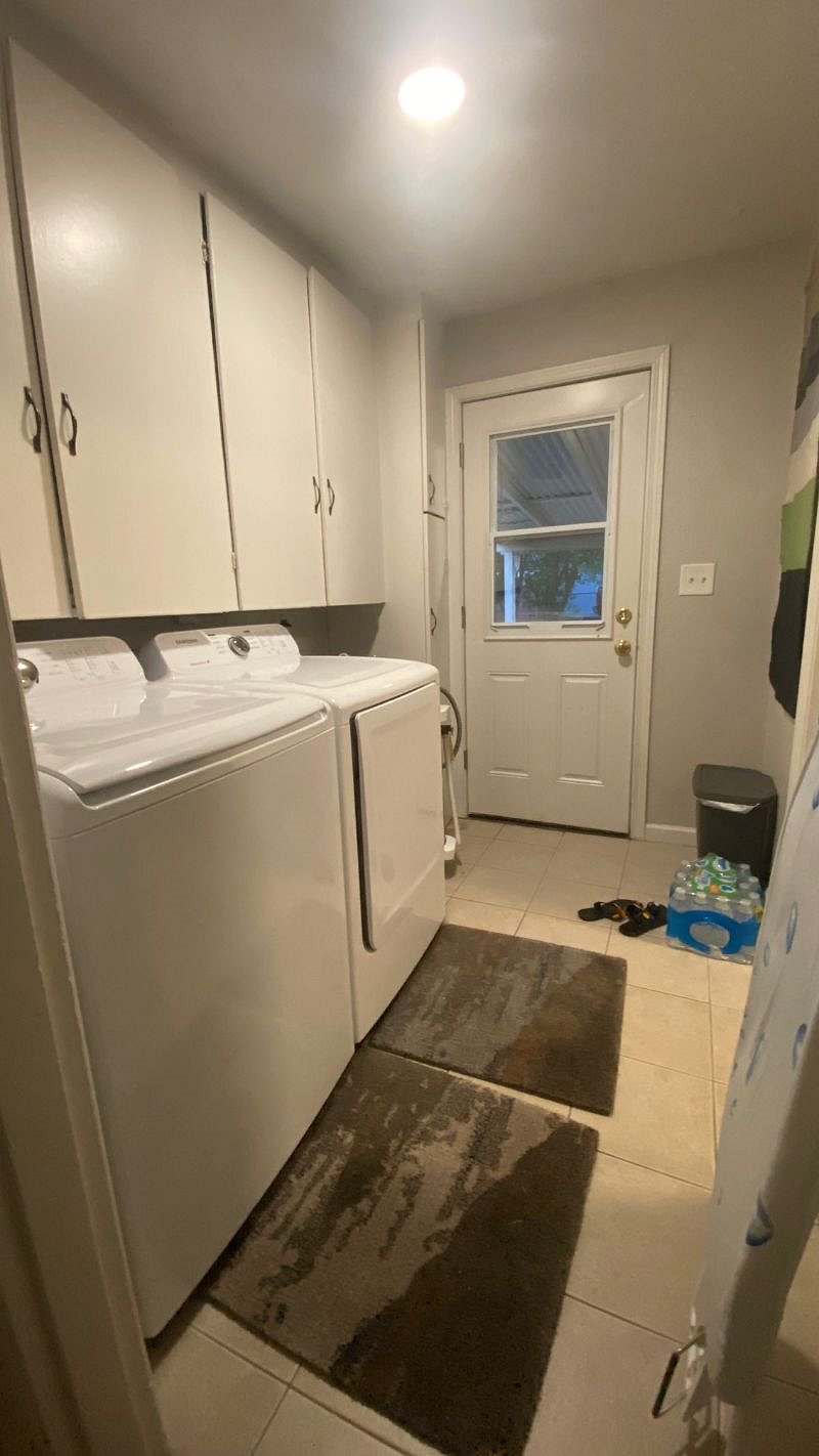 Large Washer Dryer and Ironing gear provided