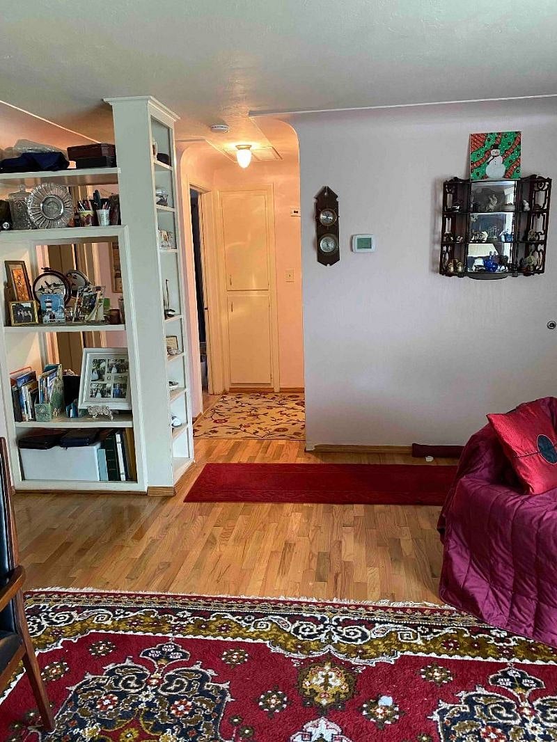 Hallway to bath and bed
