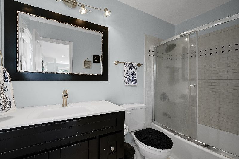 Master bathroom has shower/tub combination and single sink.