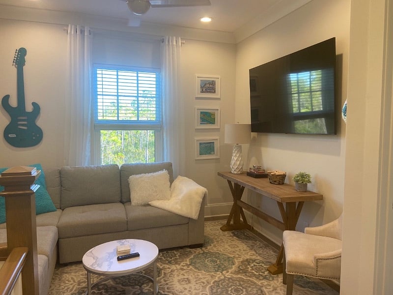 2nd floor private living room with 65" smart tv