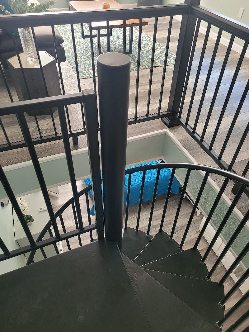 Beautiful spiral staircase down to bedroom.  Bathroom is located downstairs.