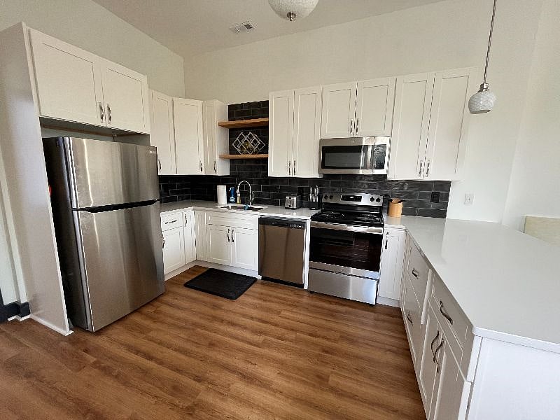 Tons of room in the kitchen. Fully stocked with dishes, pots/pans, Keurig, air fryer, etc. I