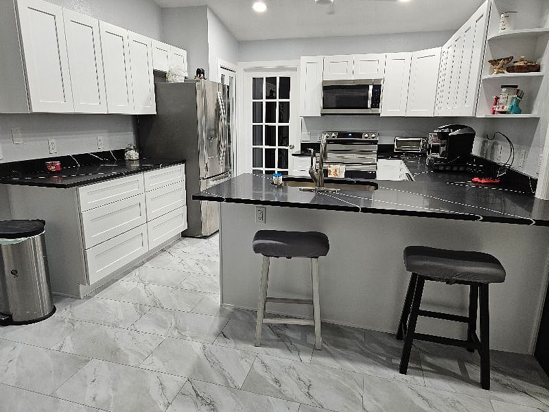 Newly renovated shared kitchen. Private food cupboard available.