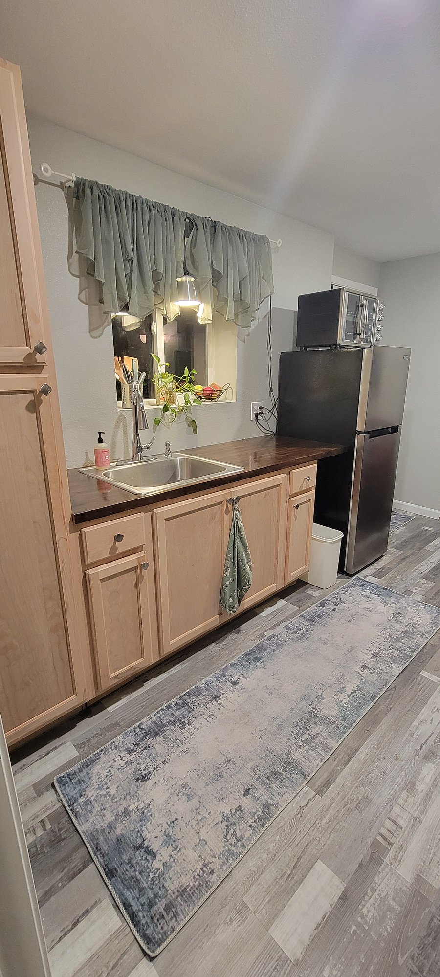 Kitchenette with microwave, 41 in 1 airfryer/oven (and then some) and portable 2 burner stovetop.