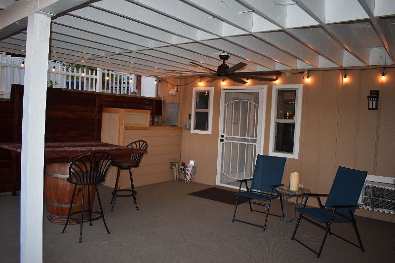 Door to backyard and part of covered patio