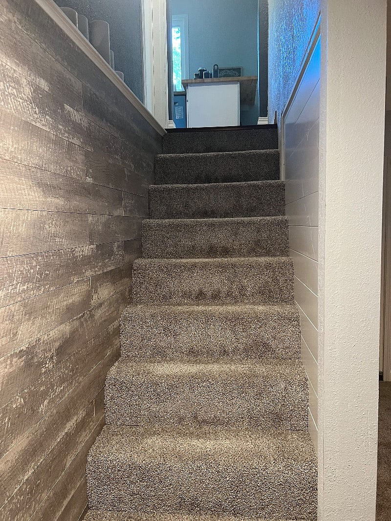 steps from main level at kitchen to lower level suite