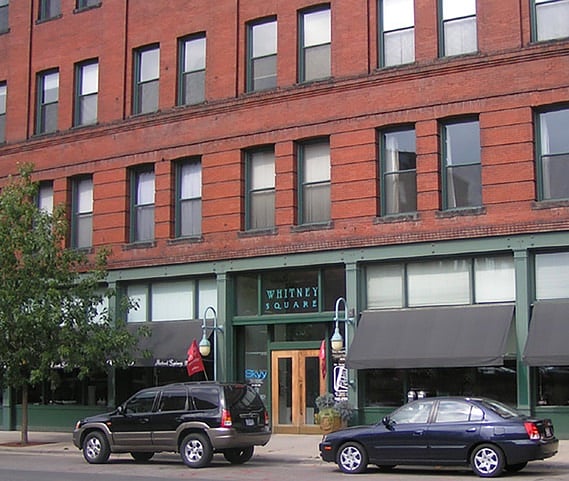 Built in 1896 as a iron warehouse, Whitney Square is one of the few remaining heavy timber warehouses. Converted to condominiums in 2003, it is one of the anchor buildings for the North Loop District. Over the decades, parking lots gave way to "Loft Style" apartment buildings and stylish restaurants. The North Loop transformed into the most vibrant desirable area in the state. Those new buildings are wonderful, but nothing can quite compete with the historic 14 foot wood ceilings and brick walls to make you feel right at home!