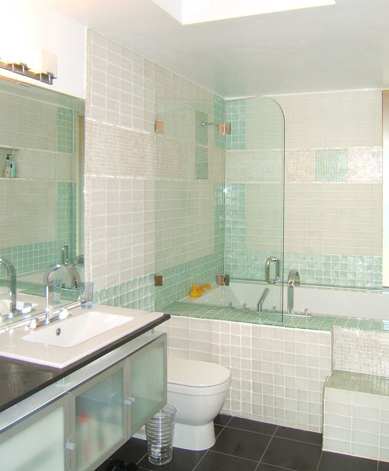 The Bathroom sparkles! Relax in the 6 foot soaking tub/shower after a hard day. Just outside are a closet for your clothing and a closet with a washer/dryer. Everything you need to start fresh in the morning!