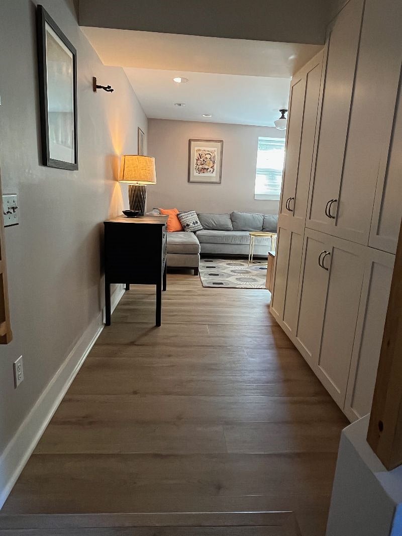 Hall into your space, extra storage cabinets to R