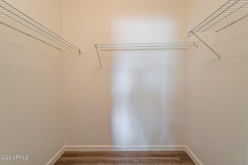 Walk-in closet is now stocked with tons of hangers.
