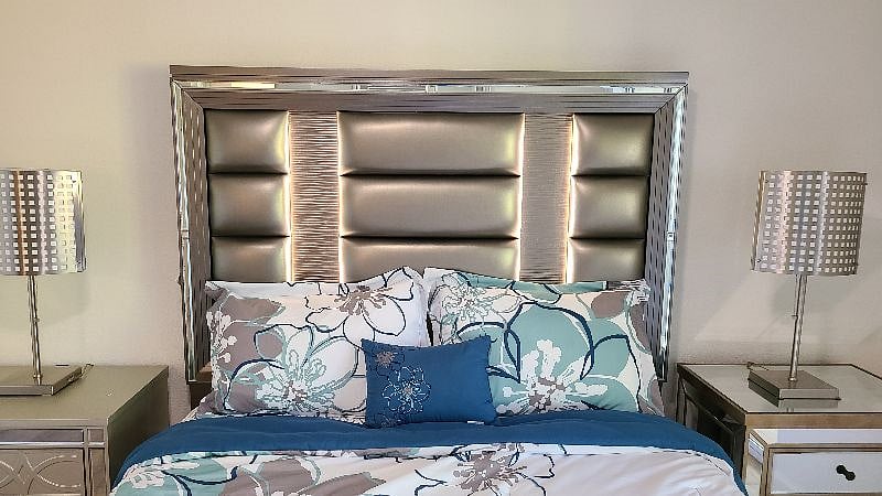 Headboard has LED lights for mood lighting.