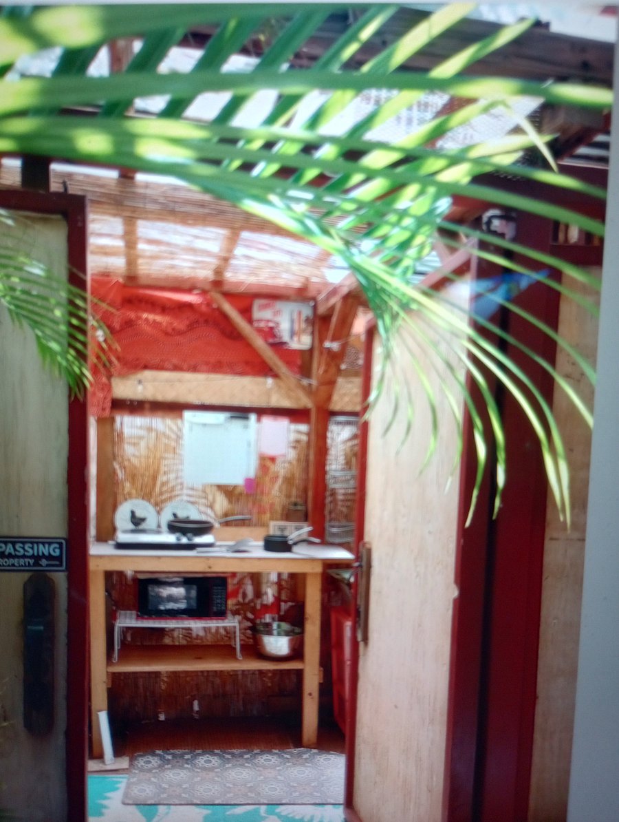 Your 2nd area, covered open air Lanai. Cute rustic "kitchenette" (Not shared)