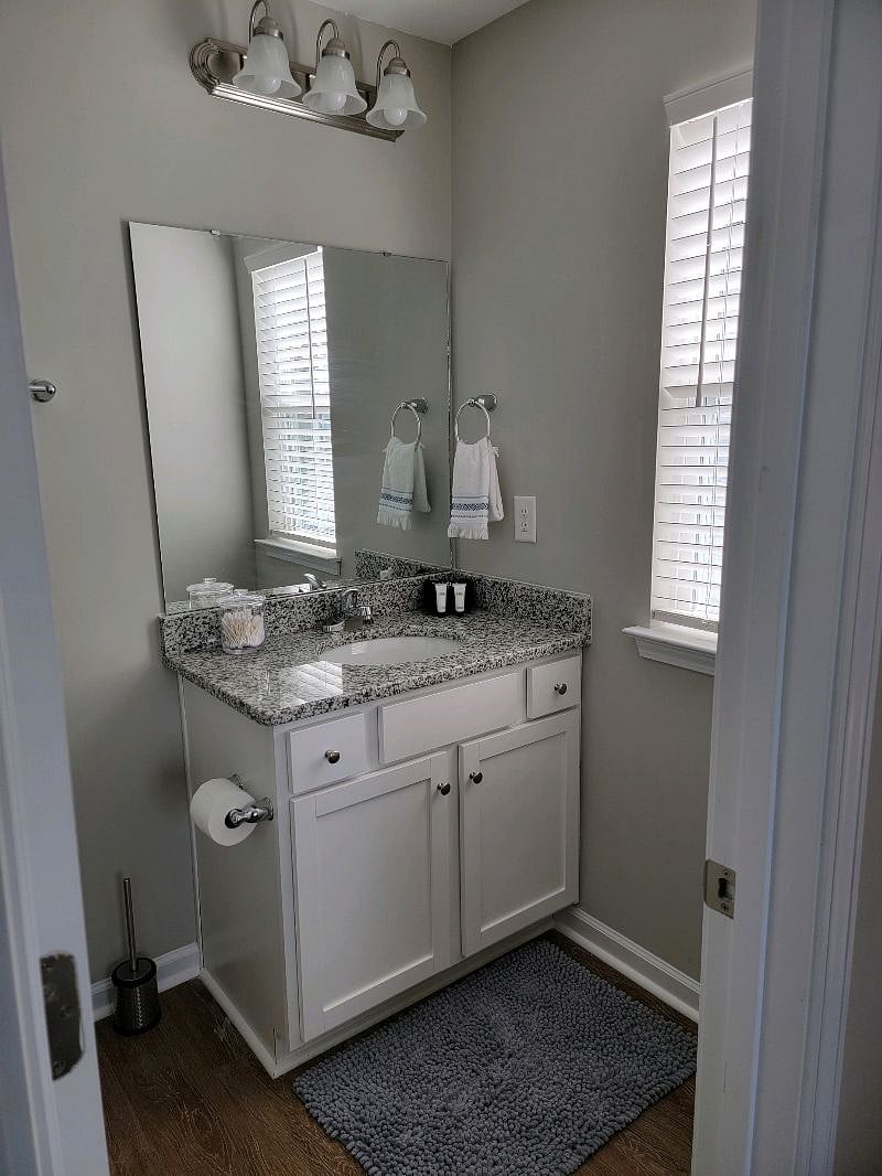 Single vanity, with storage.