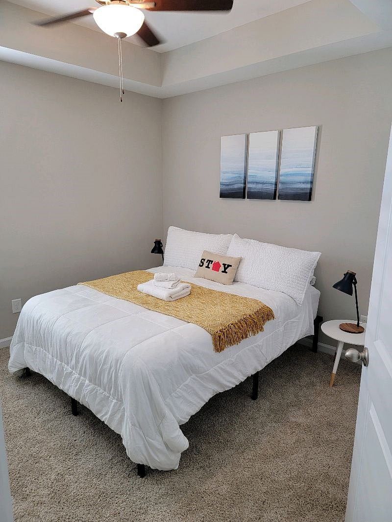 Queen Guest Bedroom with reach in closet and attached bathroom.