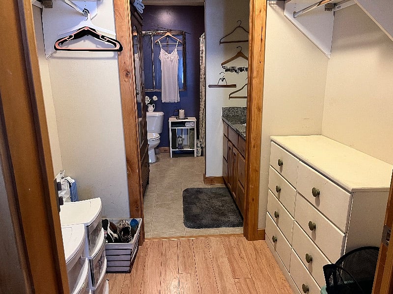 Master closet leading to bathroom