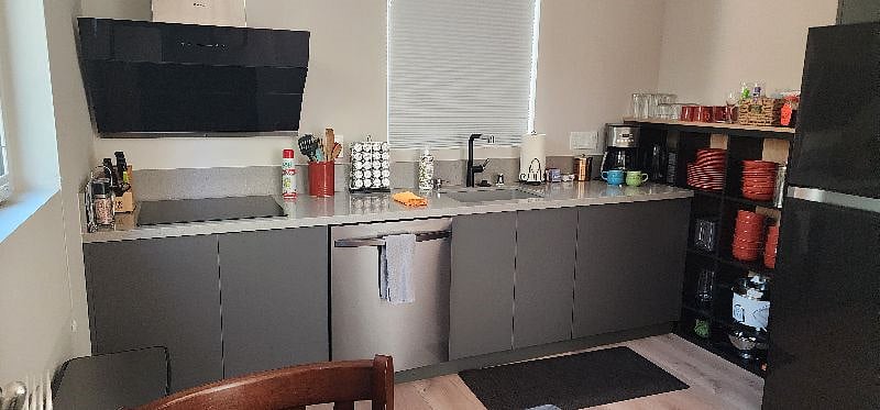 Kitchen - Complete with utensils, pots, pans, spice rack and condiments.