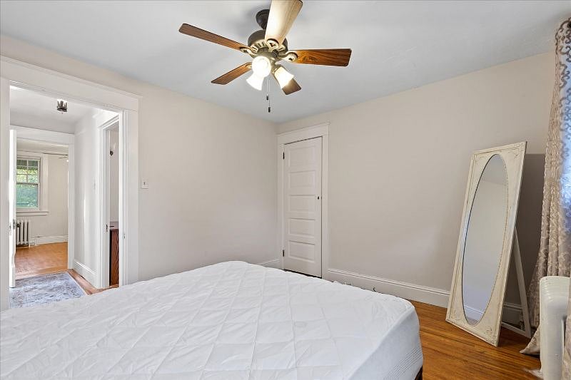 Bedroom #1. AC window unit will be pre-installed for tenant use. Closet extends deeply and provides extra storage space.