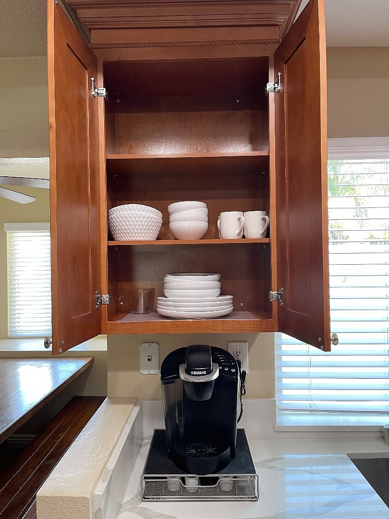 Kitchen fully stocked with new bowls, plates, cutlery, glasses/cups, pots/pans, towels, Keurig, etc.