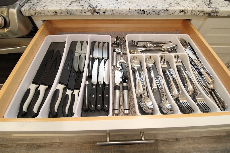 Plenty of silverware. Kitchen fully stocked with all cookware, glasses, etc. We provide starter dish detergent, dishwasher pods, trash bags, Reynolds wrap, etc.