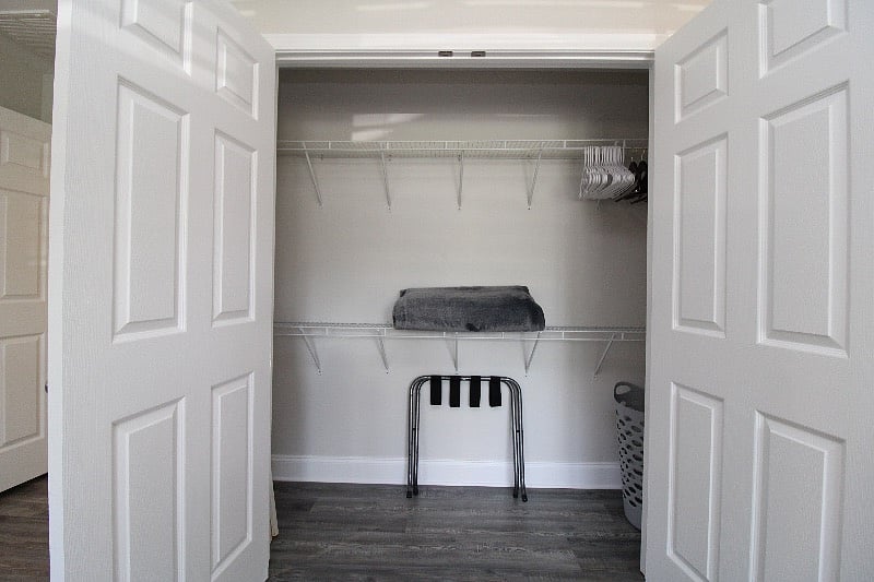 Bonus Master Bedroom closet. Extra blanket, luggage rack, laundry basket, & plenty of hangers