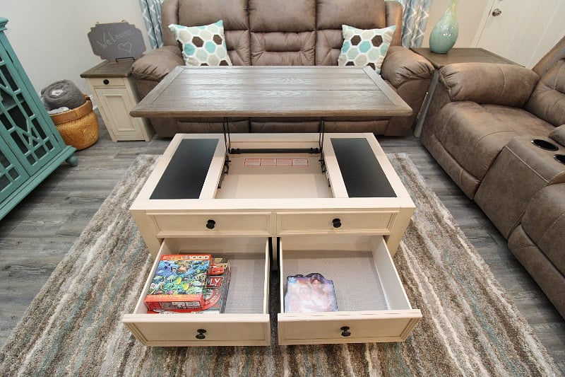 Coffee table filled with games & cards