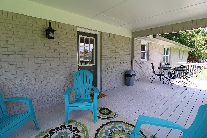 10ft x 28ft partially covered back deck w/6 Adirondack chairs, patio table, CharBroil Grill, evening string lights.