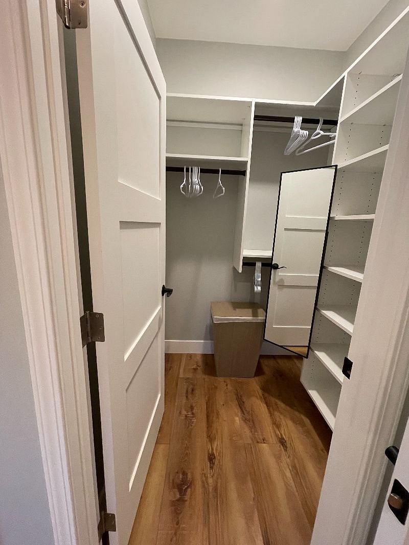 Walk-in closet 1 - Pull out full length mirror, one of my favorite features!