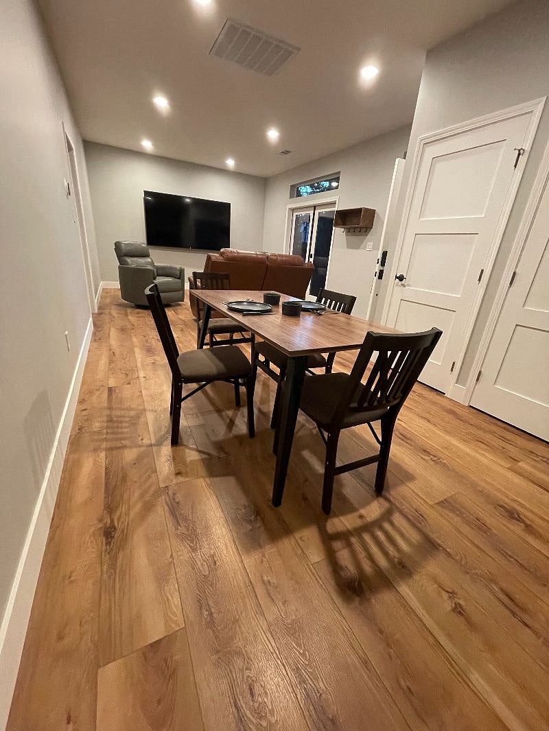 Dining area with table that seats up to 4 comfortably, or 6 if you squeeze.