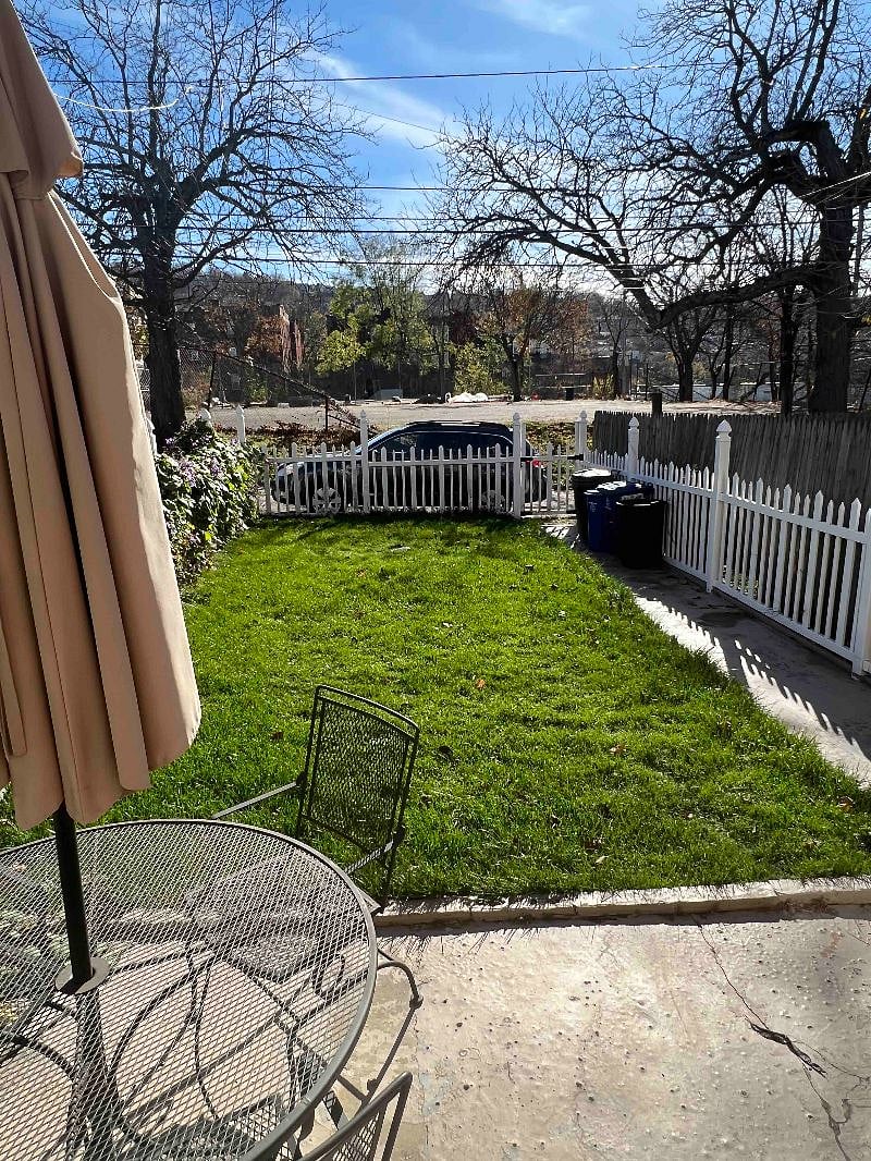 There is space to park a car in the alley behind the house as shown.