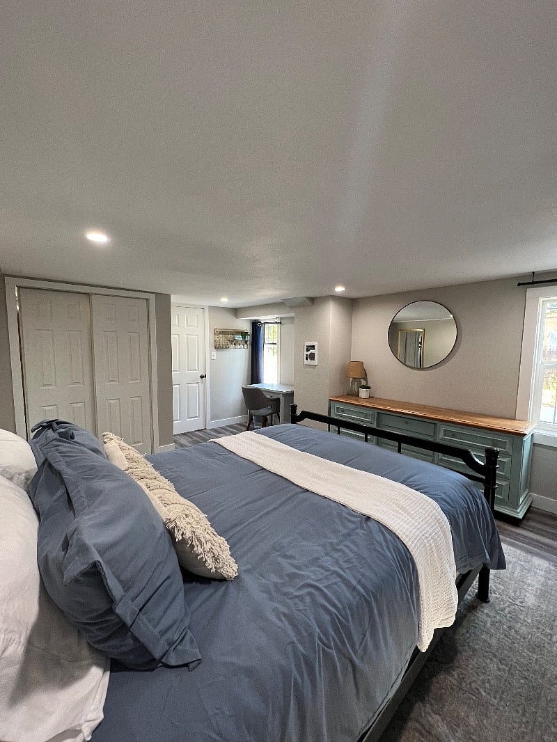 Primary bedroom with a large dresser with plenty of storage!