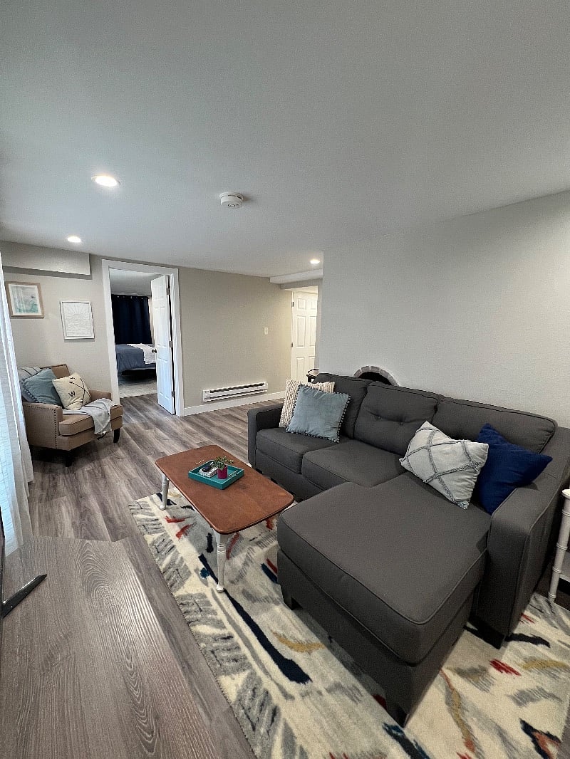 Comfy and cozy living room. The couch is a memory foam pull-out for your out of town guests.