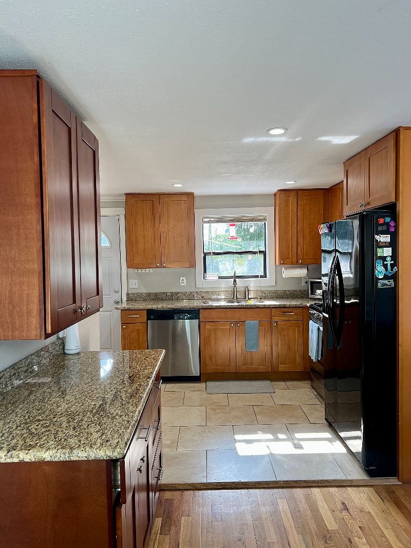 Living room leads into kitchen which is fully furnished and includes plenty of storage! 