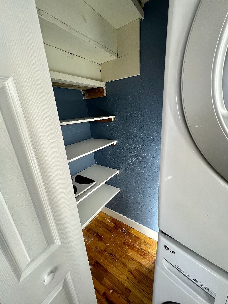 Shelves and storage next to the washer and dryer
