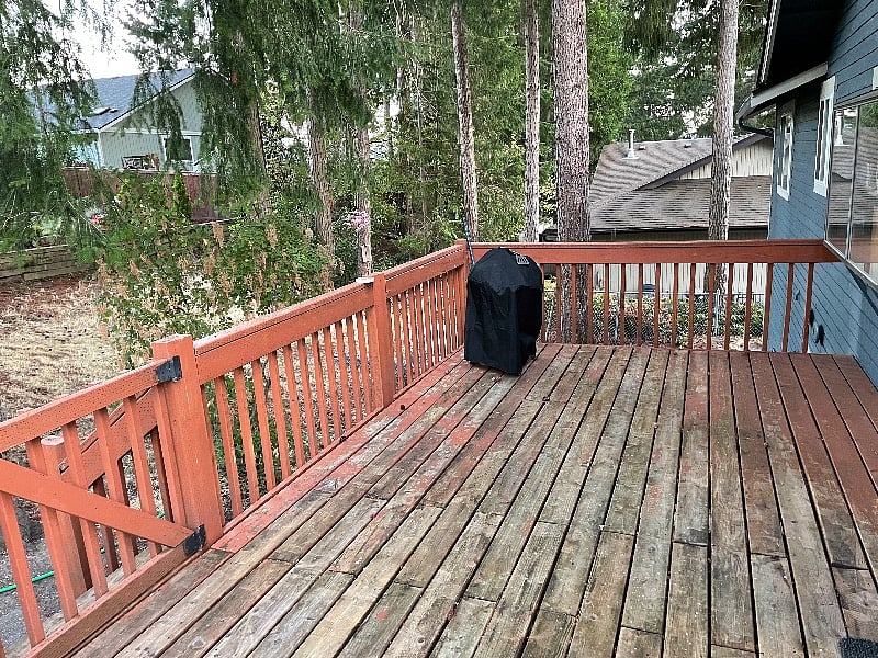 Back deck with coal BBQ for use.