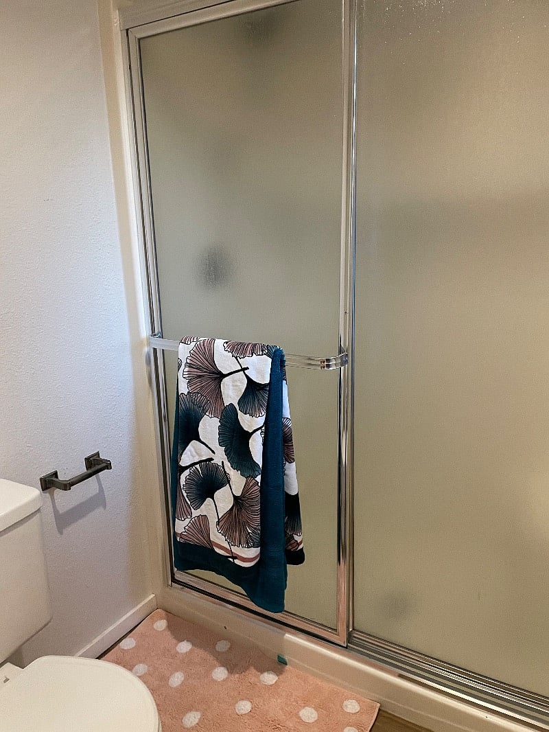 toilet and shower attached to master bedroom