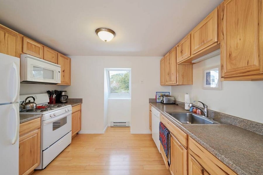 Kitchen in the second level unit. 