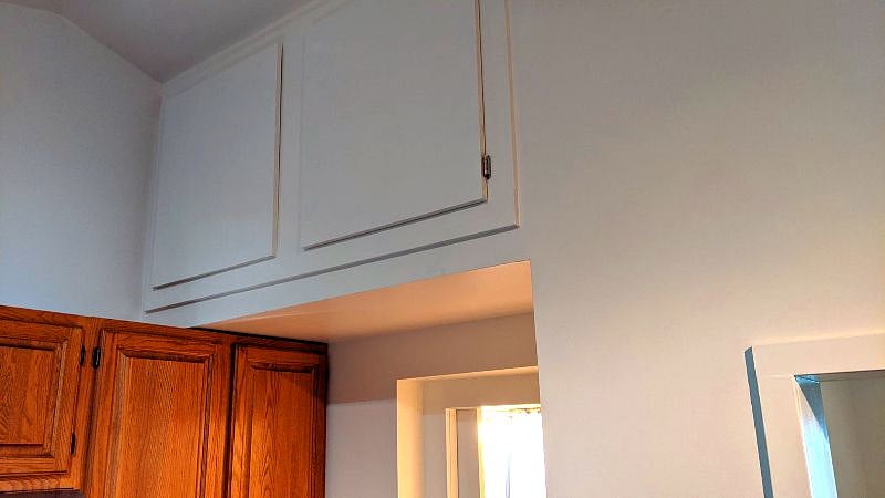 There is storage above the bathroom.