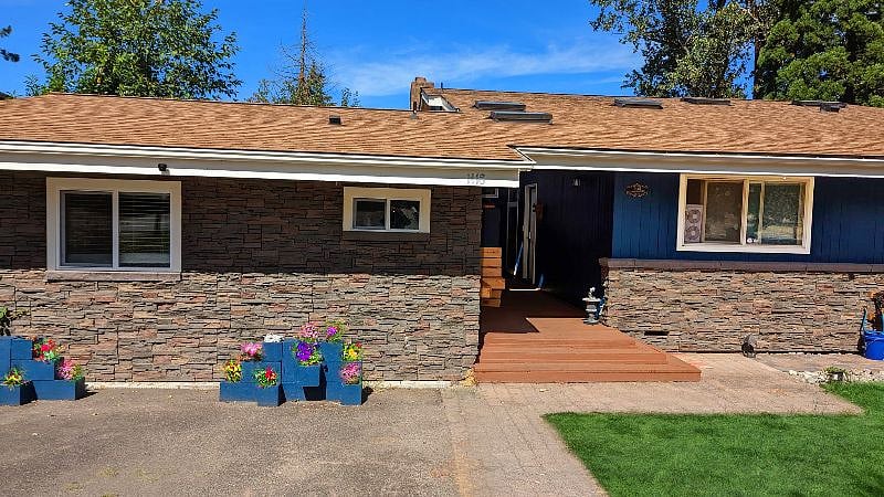 This is the front of the house and your apartment windows are right there.