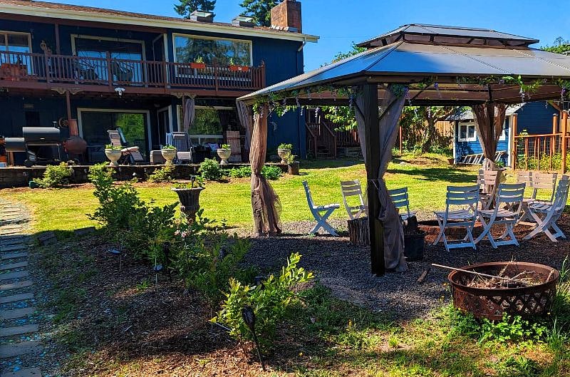 Firepit time under the pergola is glorious, during all weather.