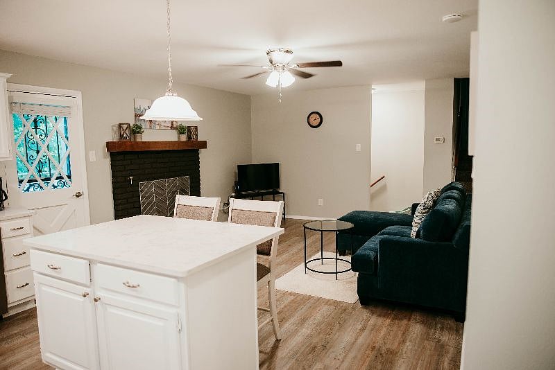 Open kitchen with breakfast bar, family room with sofa-chaise, Smart TV with Wi-Fi and gas fireplace!