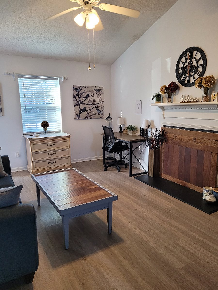Living room with dedicated work desk.