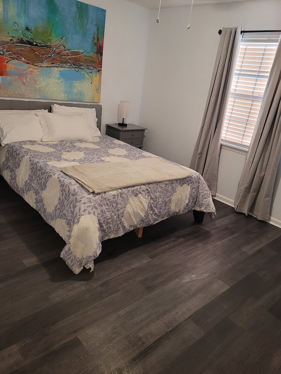 2nd bedroom with new LVP flooring. Built-in USB charging in headboard.