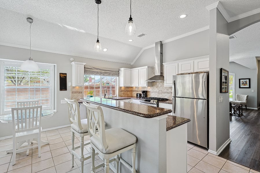 view of kitchen, island and breakfast nook