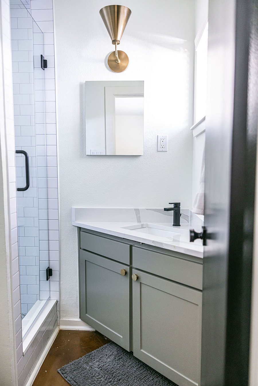 Primary Bathroom with walk-in shower (en-suite to Primary Bedroom).