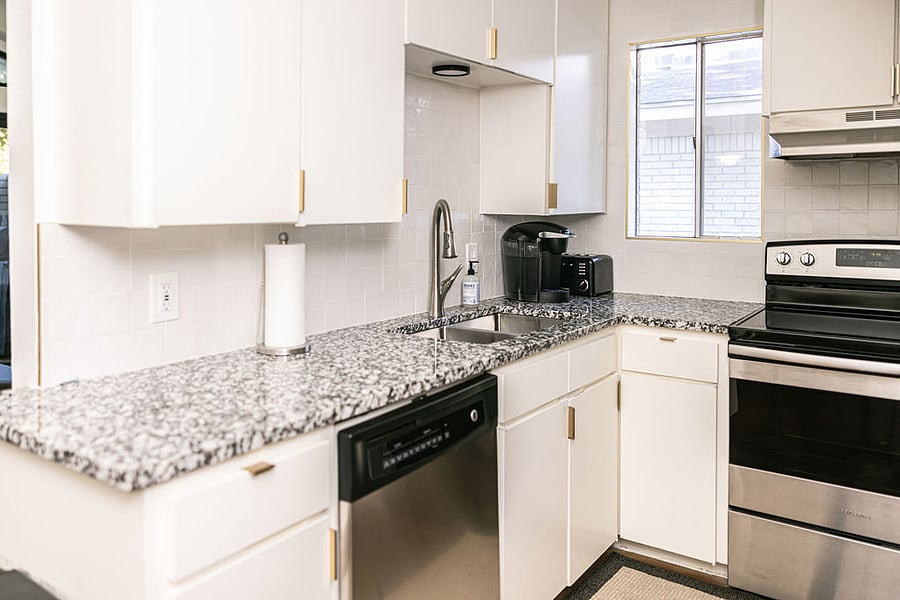 Kitchen: granite counter tops & new Kitchenaide silent dishwasher.