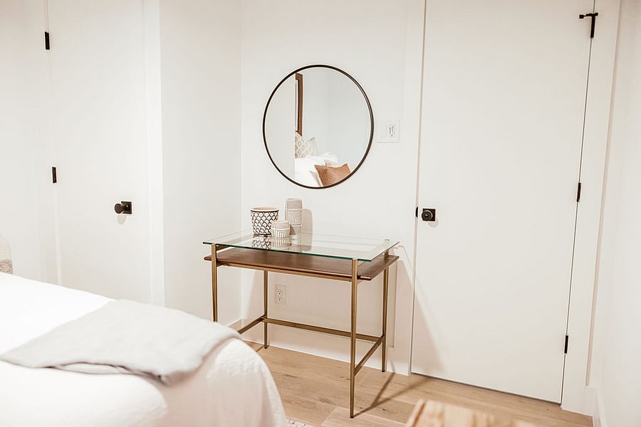 Secondary bedroom with queen bed, and closet.