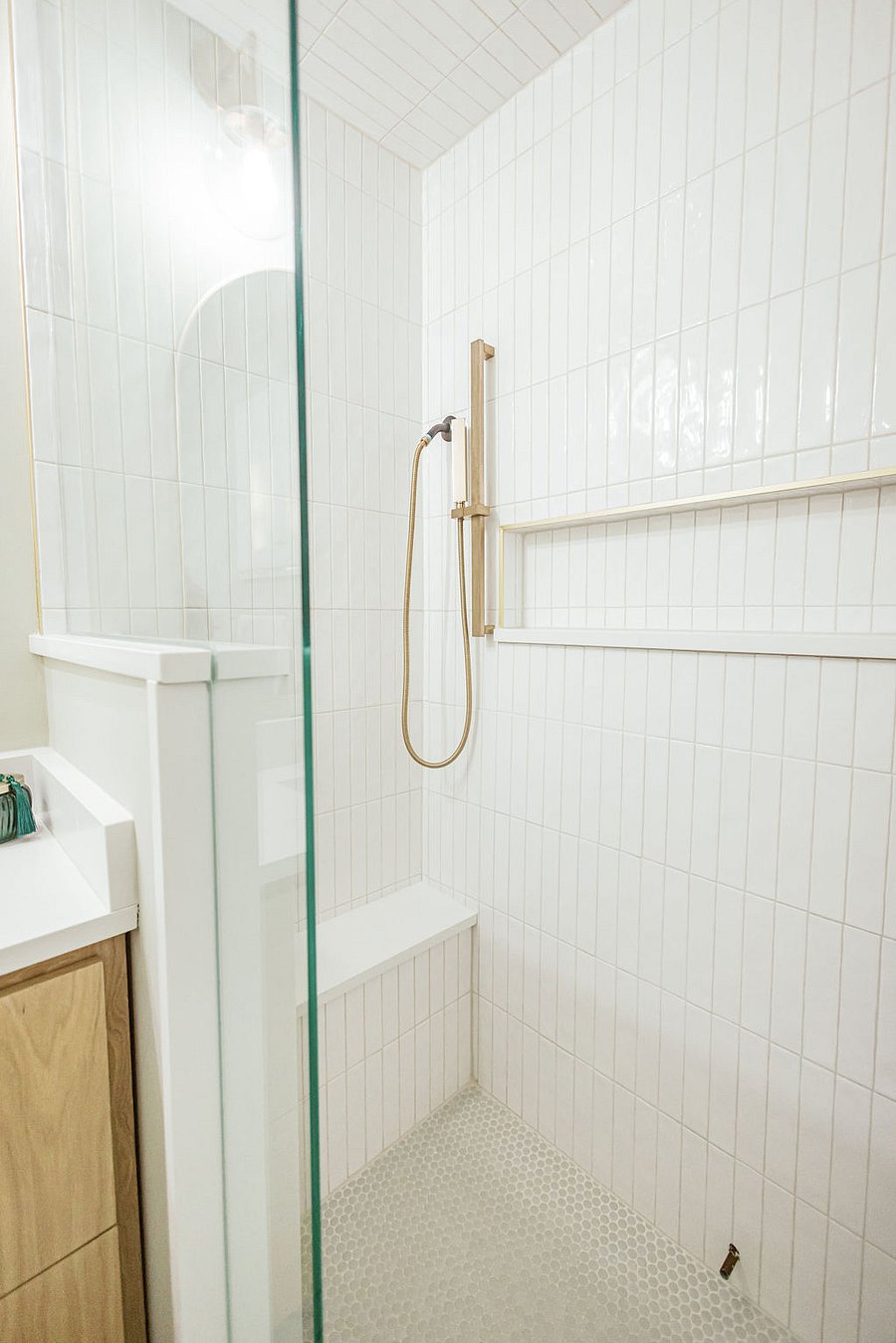 Primary en-suite bathroom with large, luxurious walk-in shower.