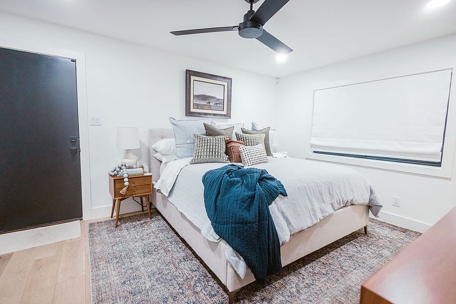 Primary Bedroom with King Bed. Large window.